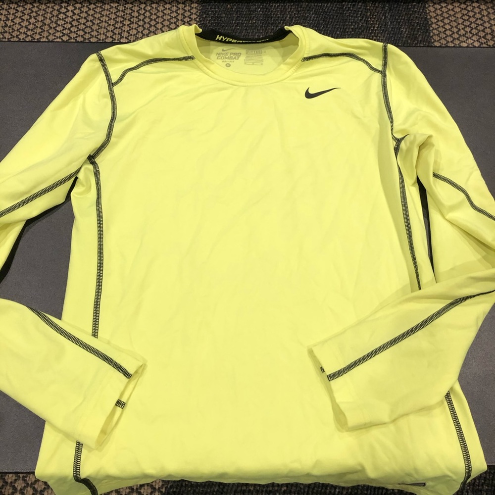 A batch of NIKE Pro Combat shirts & bottoms.